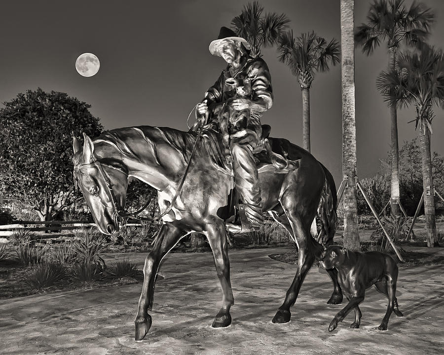 Cracker Cowboy under the Full Moon Photograph by Betty Eich