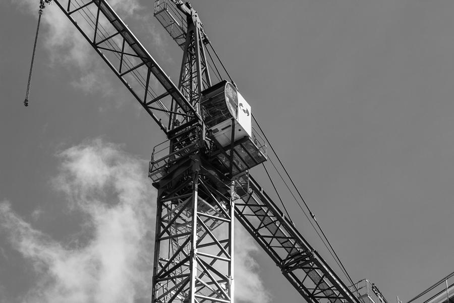 Crane Against the Sky Photograph by Robert Hebert