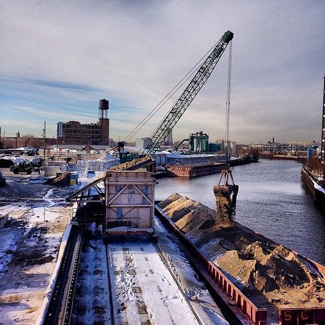Crane And Barge On The Chicago River Photograph by Art Rummery