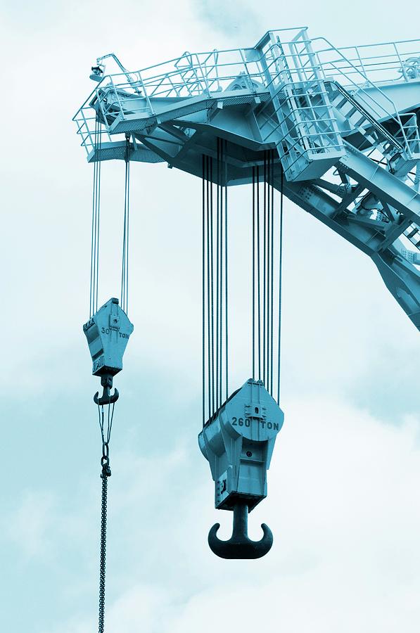 Crane Hooks On Construction Site Photograph by Christian Lagerek/science Photo Library