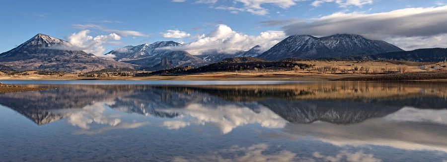 Crawford Reservoir and the West Elk Mountains Photograph by Eric Rundle