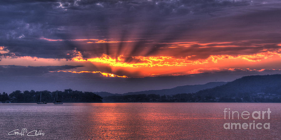 Crepuscular Dawn - Smoky Sunrise. Photograph by Geoff Childs