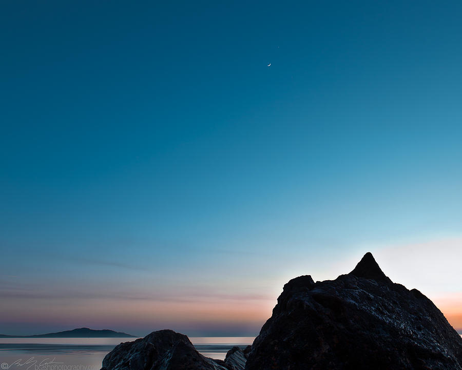 Crescent Moon and Venus above the beach Photograph by B Cash