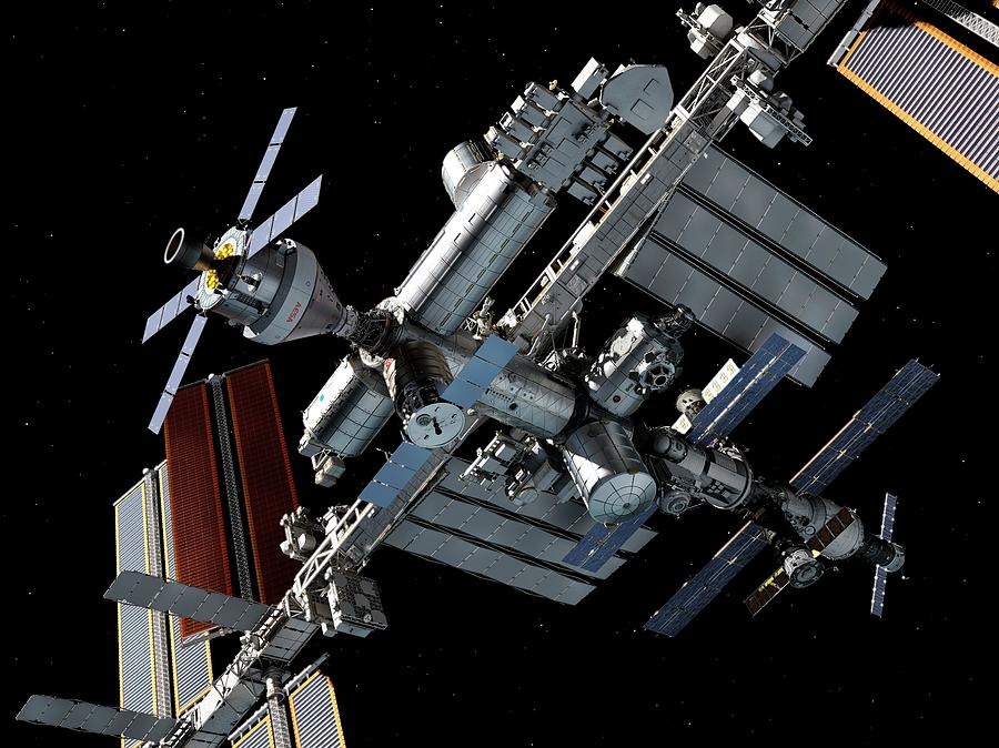 Crew Exploration Vehicle Docked With Iss Photograph by Walter Myers/science Photo Library