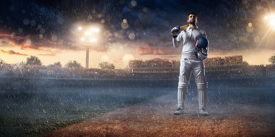 Cricket player batsman on the stadium Photograph by Dmytro Aksonov