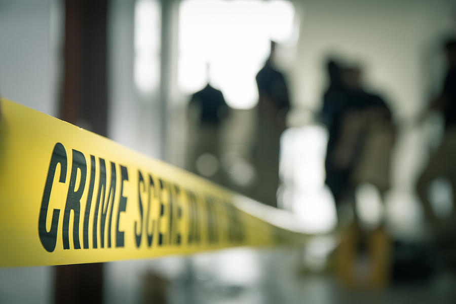 Crime Scene Tape With Blurred Forensic In Cinematic Tone Photograph by Prathaan