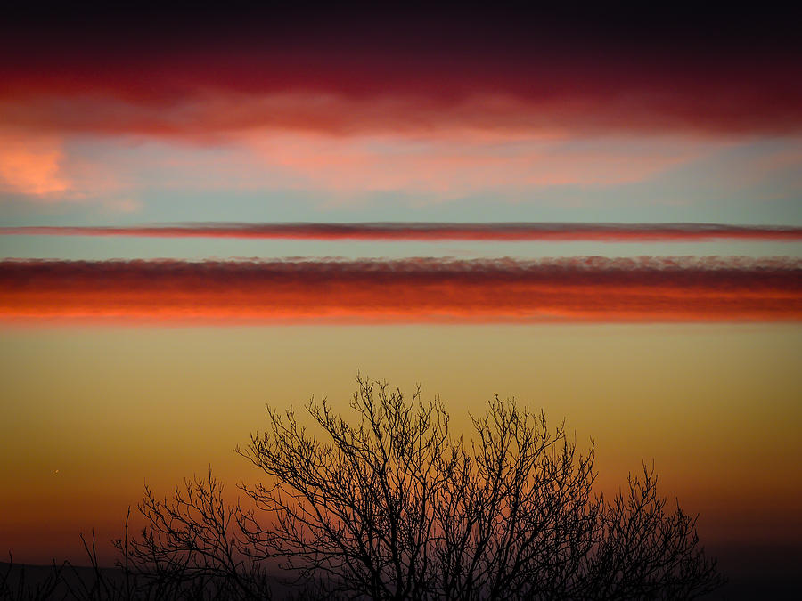 Crimson Clouds at Sunrise Photograph by James Truett