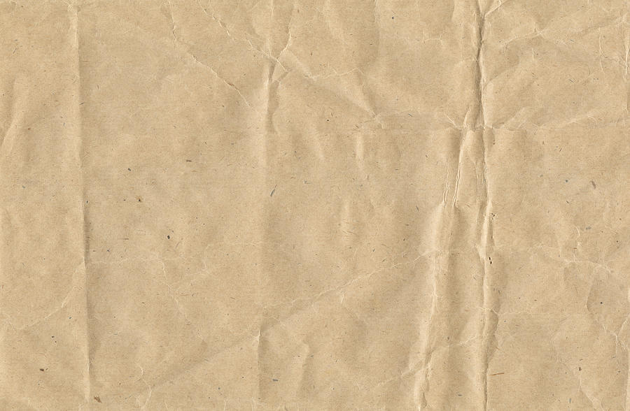 Crinkled brown paper Photograph by Tomograf