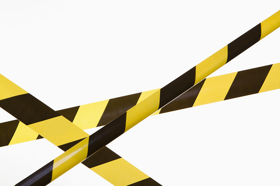 Crisscrossed yellow and black striped cordon tape Photograph by Epoxydude