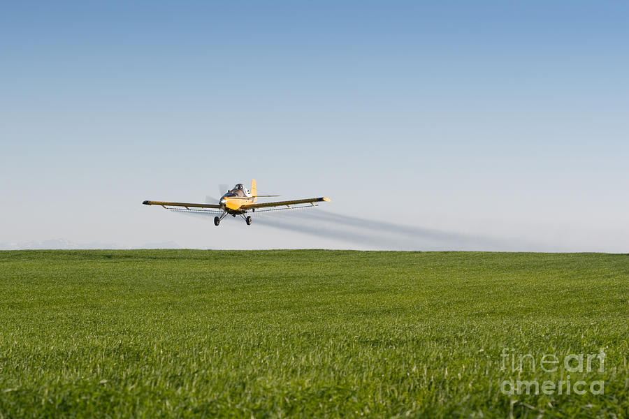 Crop Duster Airplane Flying Over Farmland Photograph by Cindy Singleton