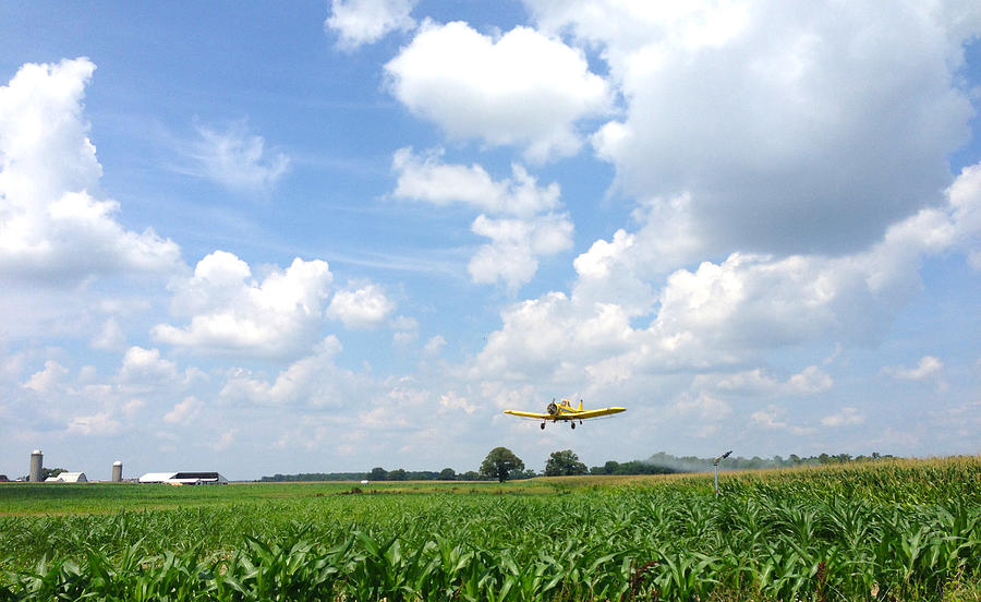 Farm Photograph - Yellow Crop Duster by Charles Kraus