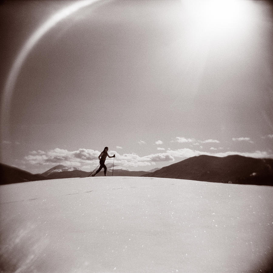 Winter Photograph - Cross Country Skier by Matthew Lit