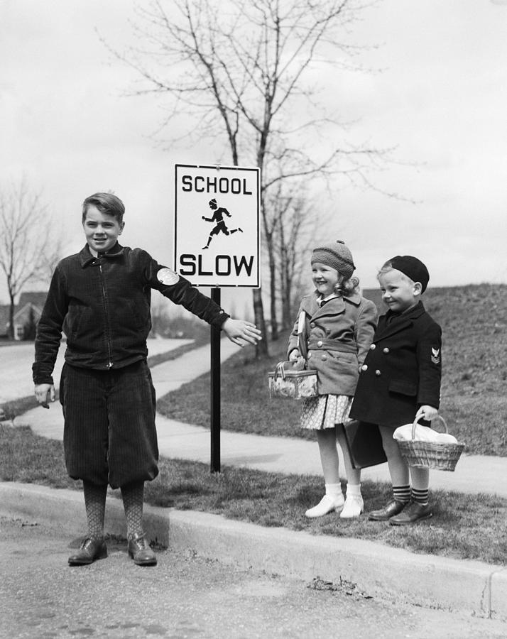 Crossing Guard And Children, C.1930s Photograph by H. Armstrong Roberts/ClassicStock