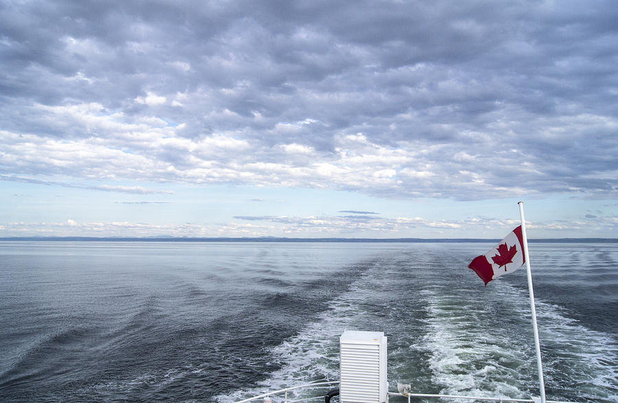Crossing the St-Lawrence Photograph by Arkady Kunysz