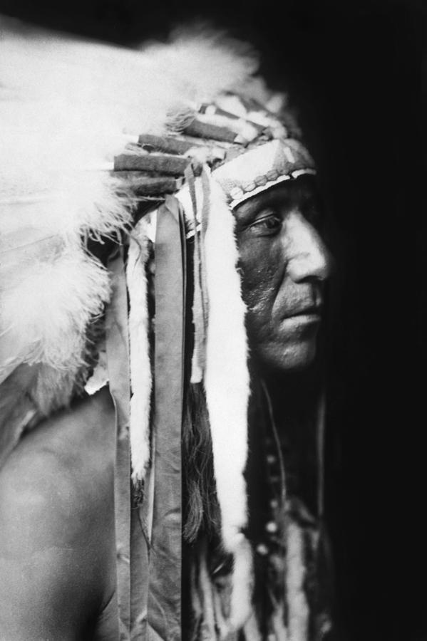 Edward Sheriff Curtis Photograph - Crow Indian man circa 1905 by Aged Pixel
