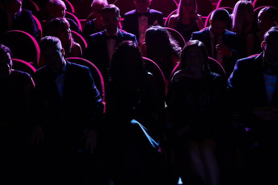 Crowd in dark watching opera in theater Photograph by Izusek