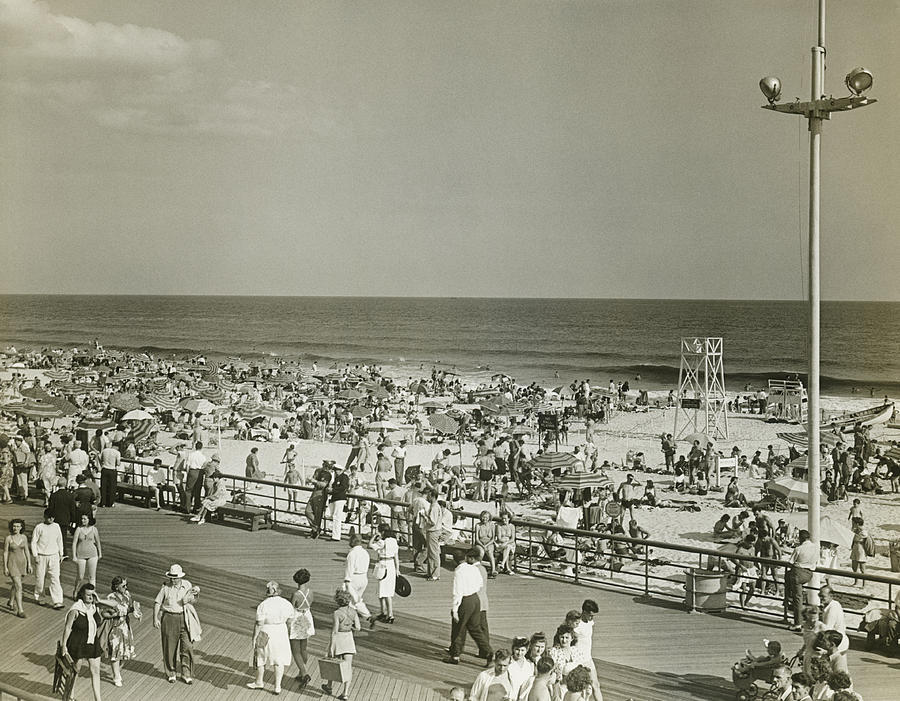 Crowded beach, elevated view Photograph by George Marks