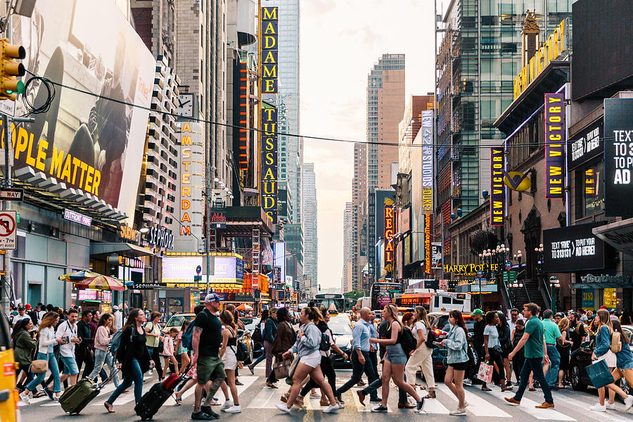 Crowds of people crossing street on zebra crossing in New York, USA Photograph by Alexander Spatari