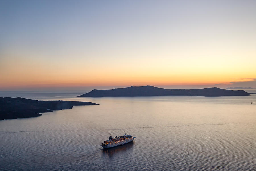 Cruise ship at sunset Photograph by Matteo Colombo