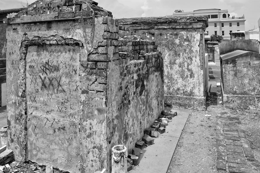 New Orleans Photograph - Crumbling Wishes At Saint Louis Cemetery in Black and White by Greg and Chrystal Mimbs