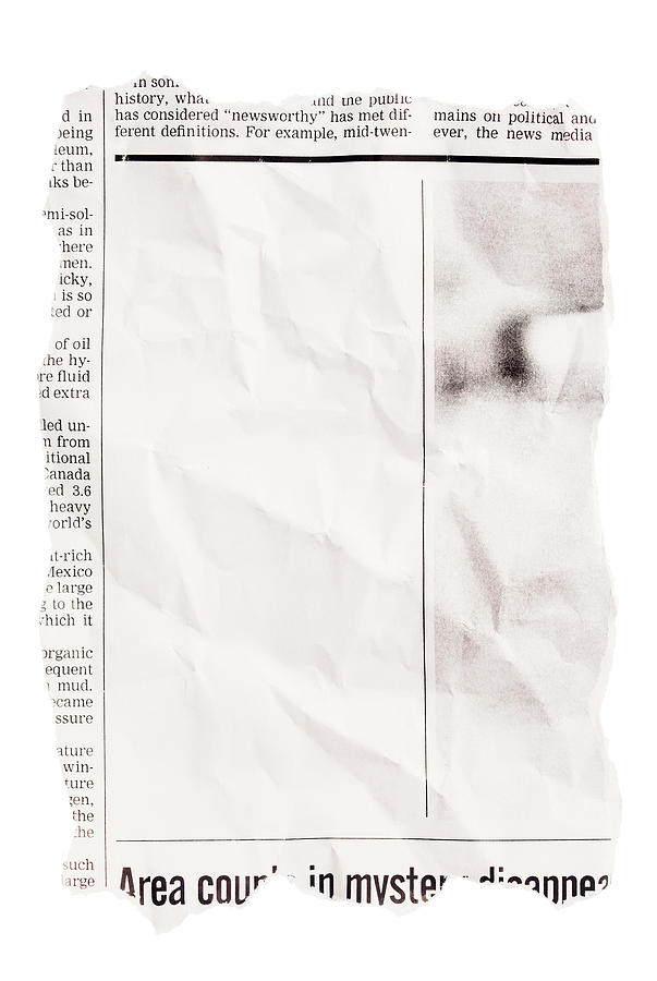 Crumpled torn out newspaper clipping with blank space Photograph by RapidEye