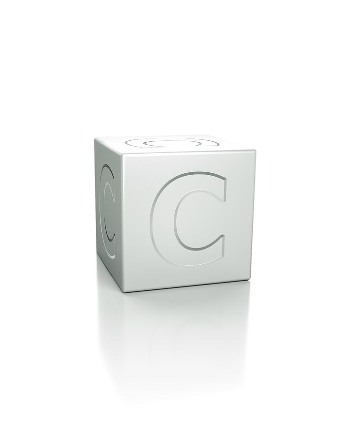 Cube Photograph - Cube With The Letter C Embossed by David Parker/science Photo Library