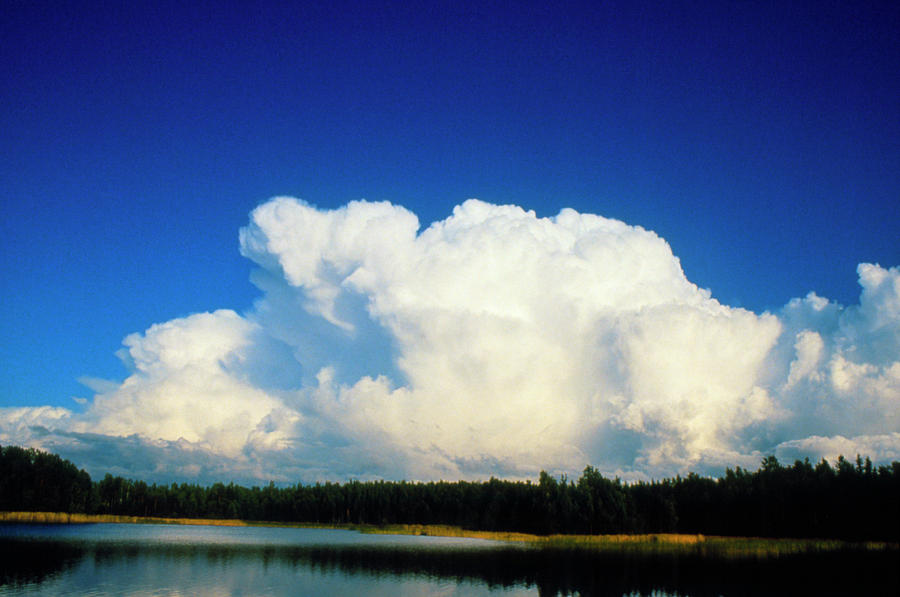 Cumulonimbus Anvil Clouds Seen Approaching Lake Photograph by Pekka Parviainen/science Photo Library