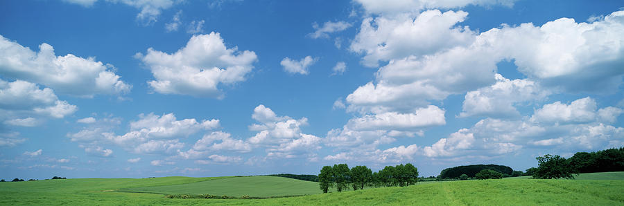 Cumulus Clouds Over A Landscape, Germany Photograph by Panoramic Images