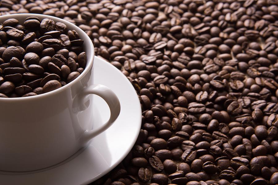 Cup And Coffee Beans Photograph by Derek Northrop