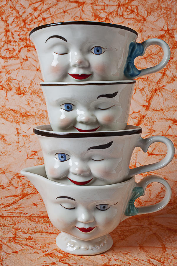 Cup faces Photograph by Garry Gay