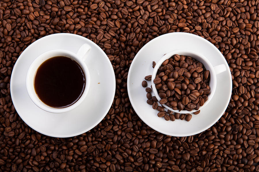 Cup Of Coffee And Cup With Coffee Beans Photograph by Raimond Klavins