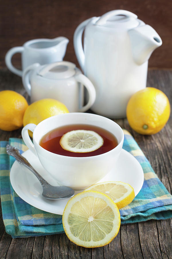 Cup Of Tea With Lemon Photograph by Anjelika Gretskaia