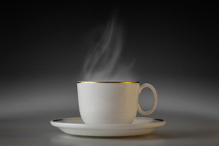 Cup With Steam Photograph by Bjorn Holland