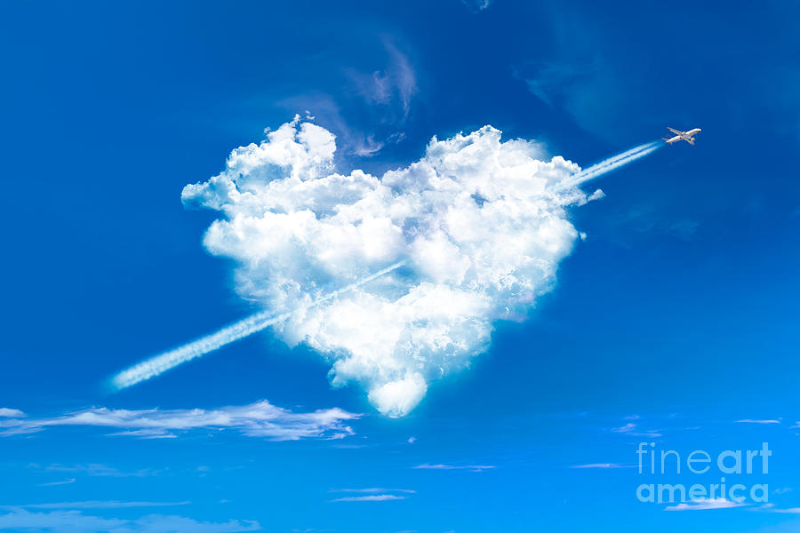 Cupid, plane and heart shaped cloud Photograph by Delphimages Photo Creations