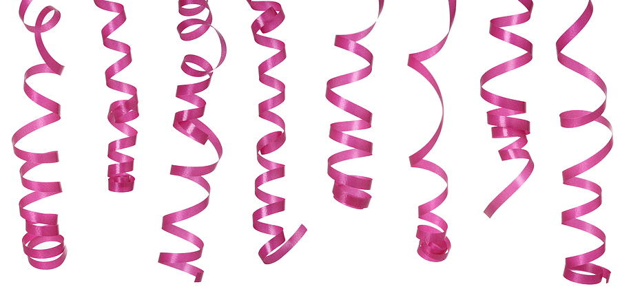 Curled pink ribbons on a white background Photograph by Pannonia