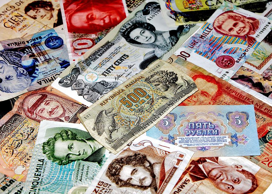 Currencies Photograph by Benjamin Yeager