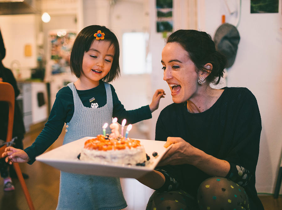 Cute toddler girl showing excitement with her birthday cake Photograph by Ippei Naoi
