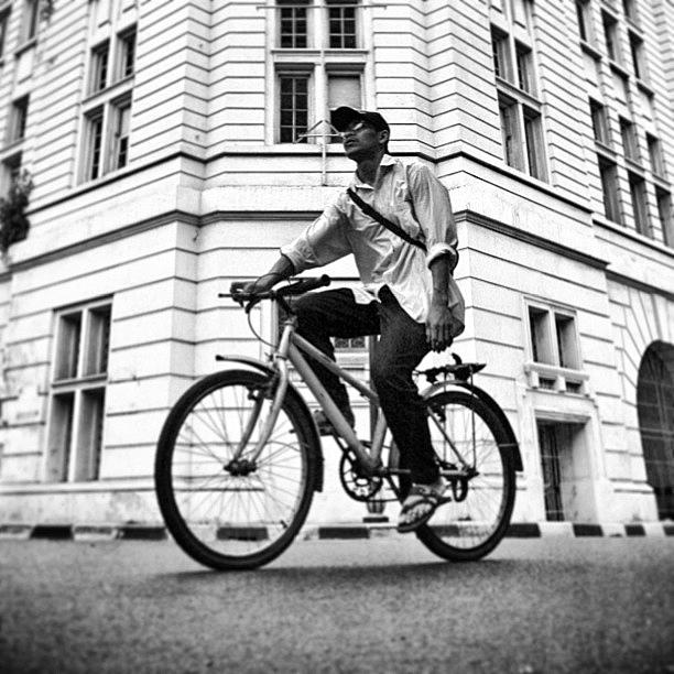 Bw Photograph - Cycling #bw #streetphotography by Dani Daniar