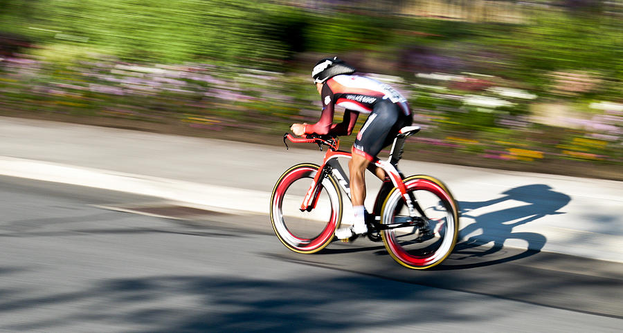 Cyclist Racing the Clock Photograph by Kevin Desrosiers