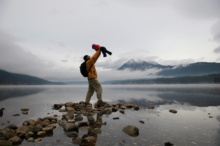 Dad In Hiking Clothes Holds Baby Girl Photograph by Chris Linder - Fine Art  America