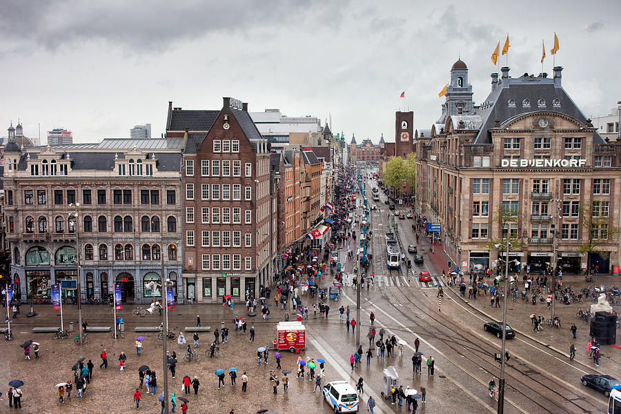 Dam Square and Damrak Street in City Center of Amsterdam Photograph by Artur Bogacki