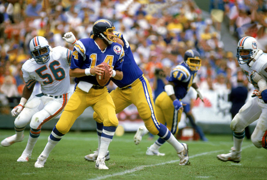 Dan Fouts looks to pass Photograph by Tony Duffy