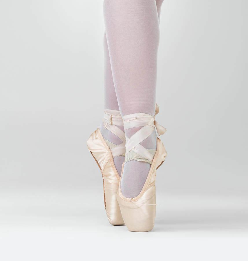 Dancer In Ballet Shoes Dancing In Photograph by Yuri