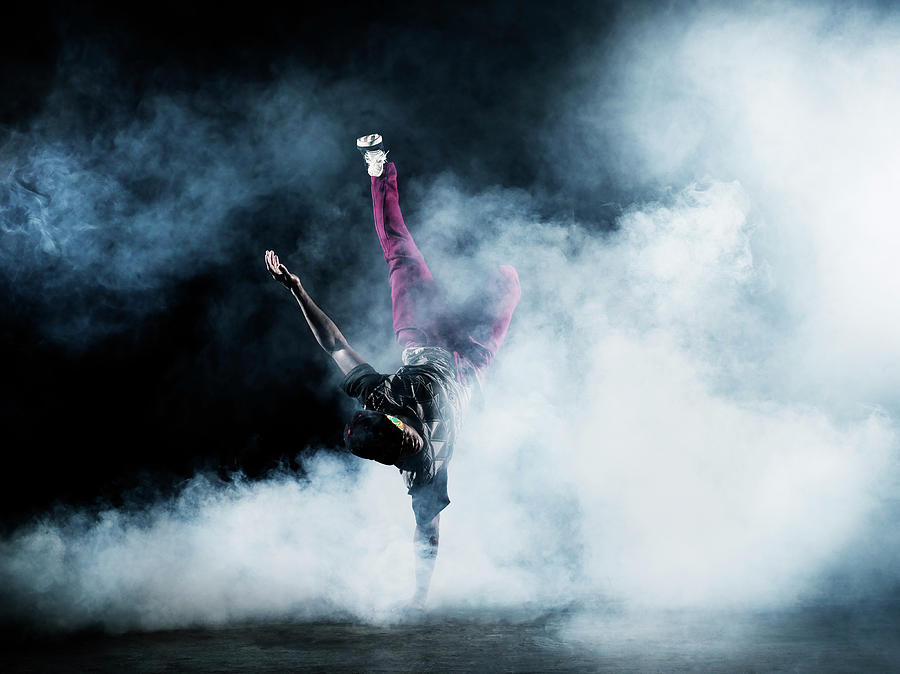 Dancer Surrounded By Smoke Photograph by Henrik Sorensen