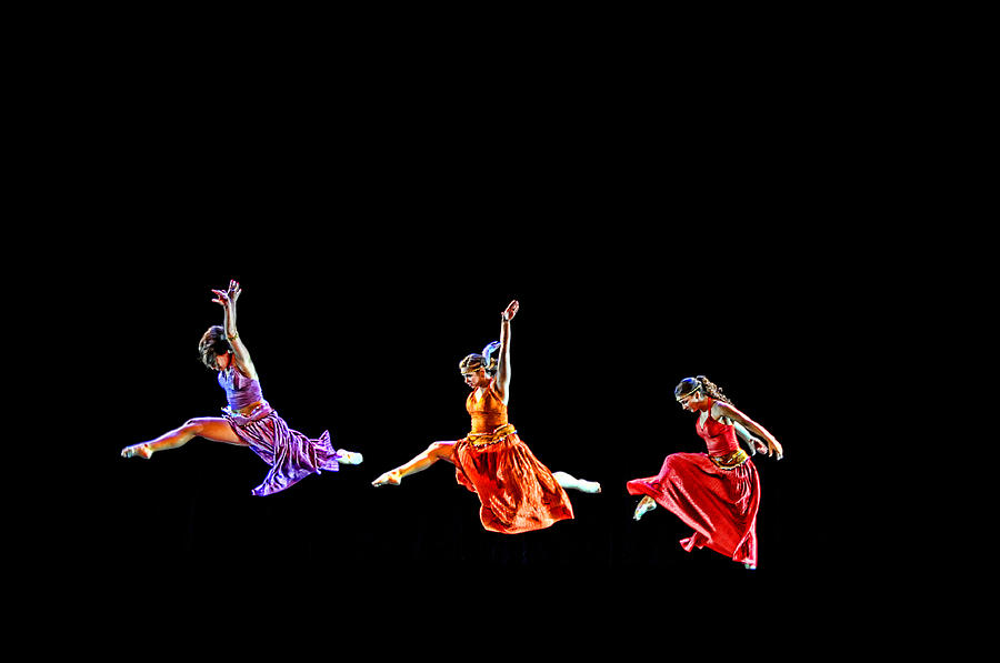 Dancers in Flight Photograph by Bill Howard