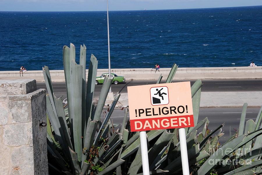 Danger on the Malecon Photograph by Andrea Simon
