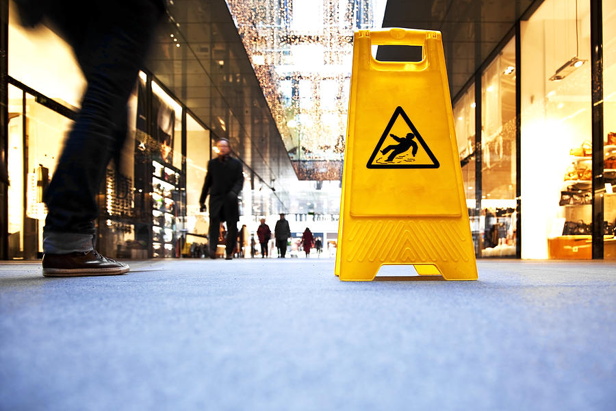 Danger Sign In A Shopping Mall Photograph by Bertlmann