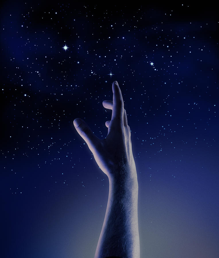 Dark blue and black Graphic of a hand reaching for stars Photograph by Panorios