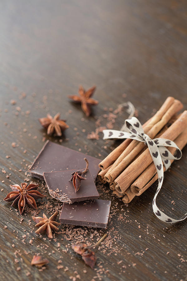 Dark Chocolate And Cinnamon Sticks Photograph by Elin Enger