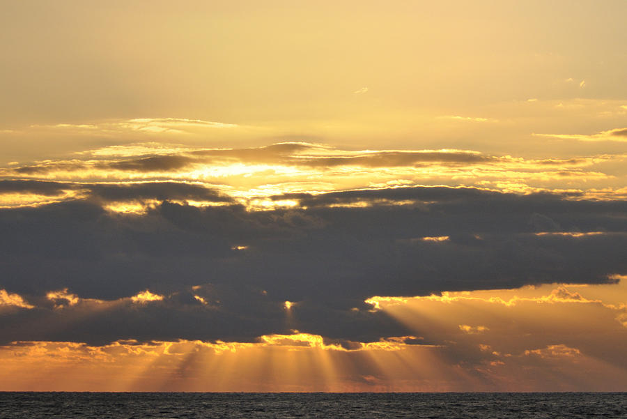 Dark Cloud Over Sea With Sunbeams Photograph by Bradford Martin